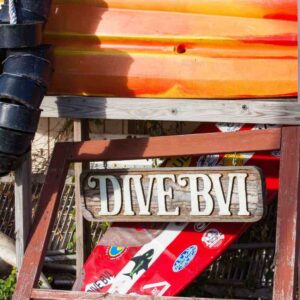 DIVE BVI signage red white surfboard