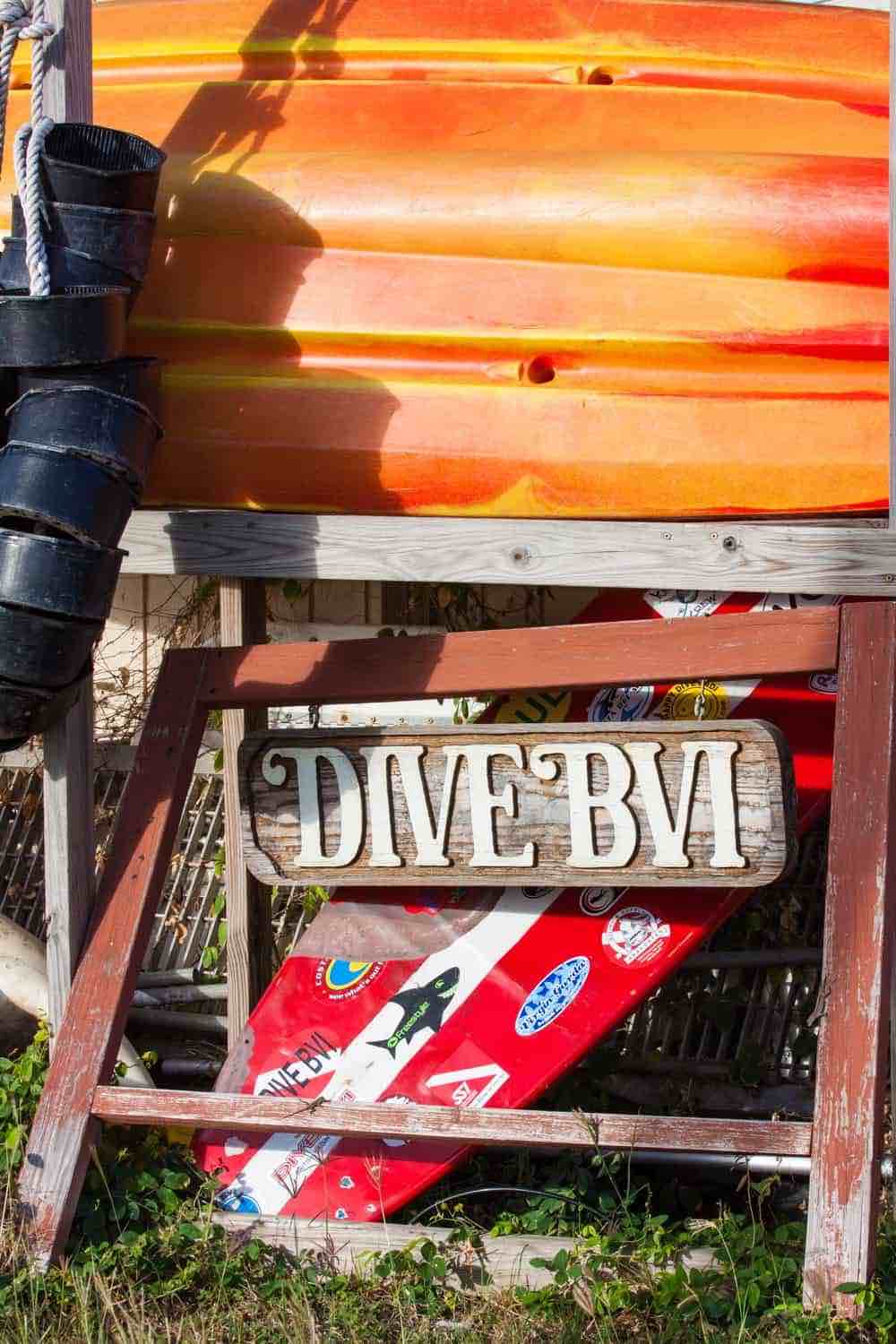 DIVE BVI signage red white surfboard